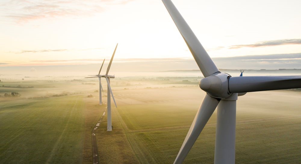 Wind turbines in green field