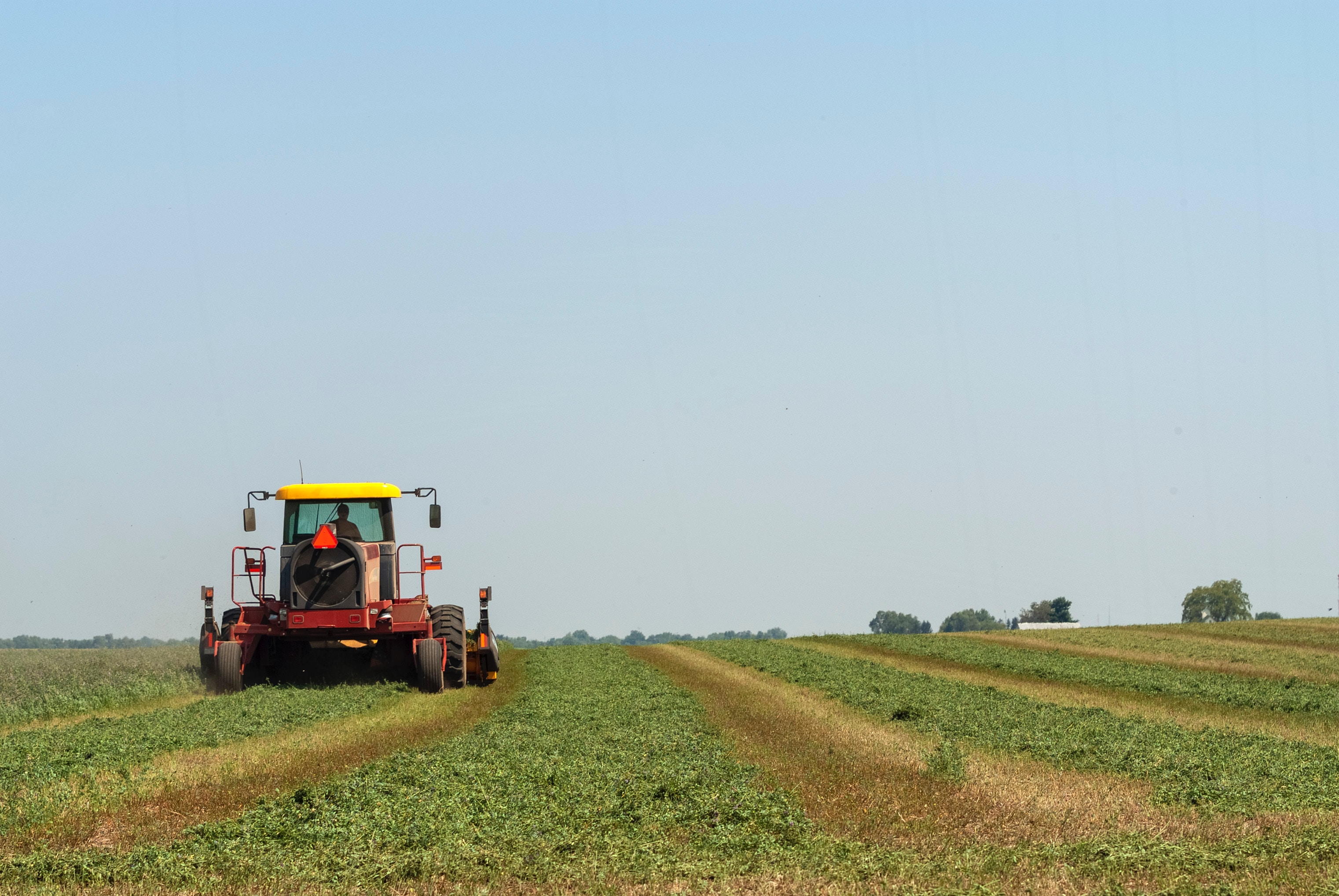 image showing a tractor in a field