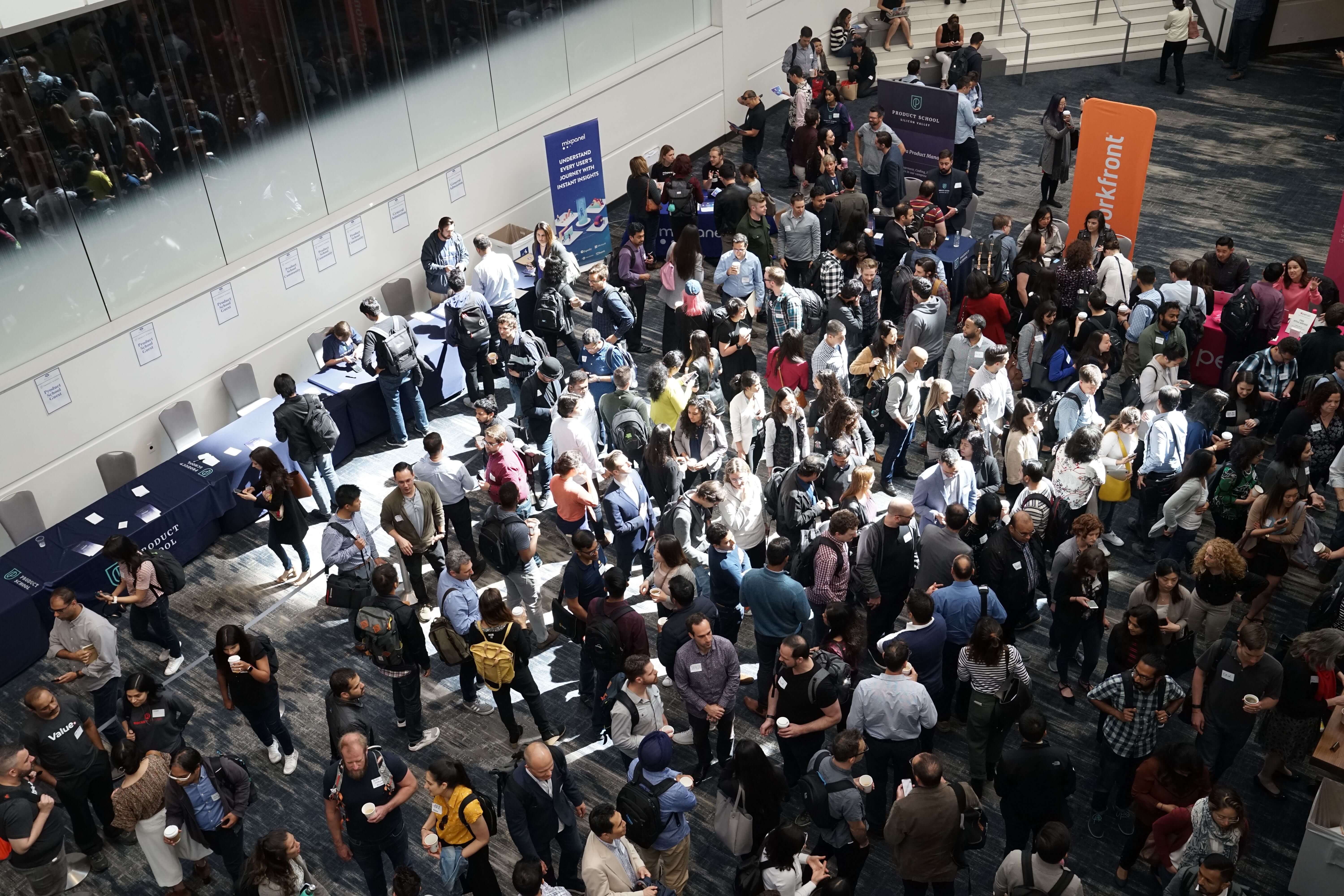 image of attendees mingling at a large event