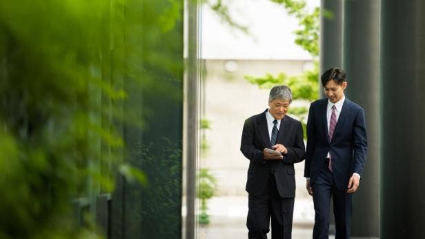 Two businessmen walking