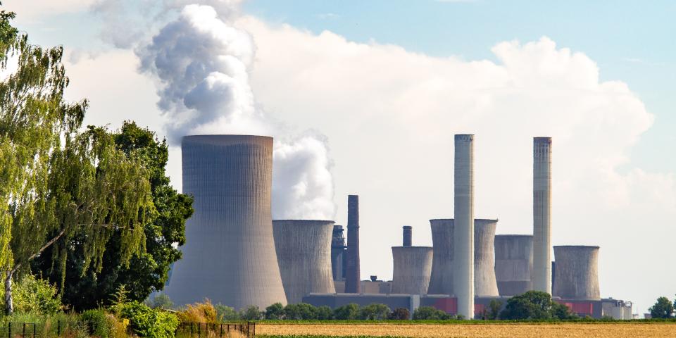 Photo of nuclear power plant chimneys from a distance
