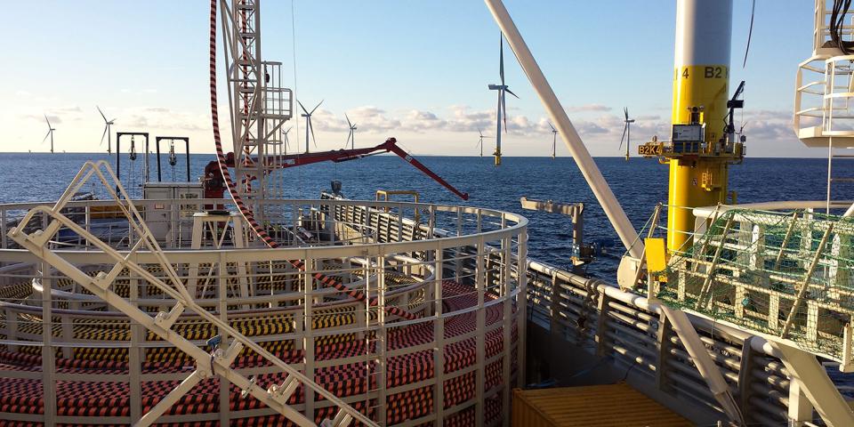 Cable laying sea vessel at wind farm