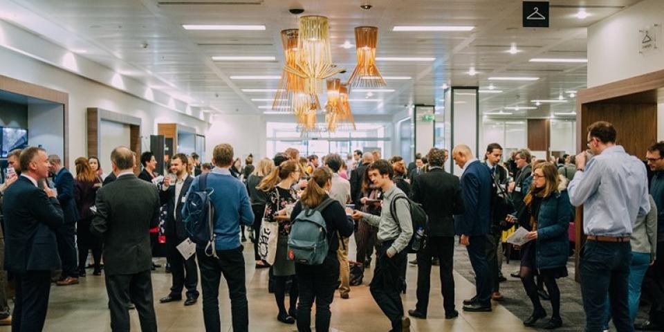 Event attendees mingling at the Low Carbon Cities 2018 conference