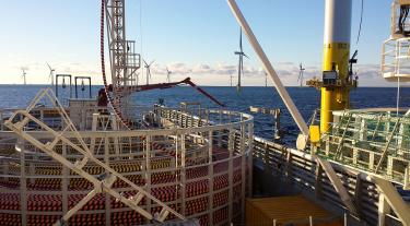 Cable laying sea vessel at wind farm